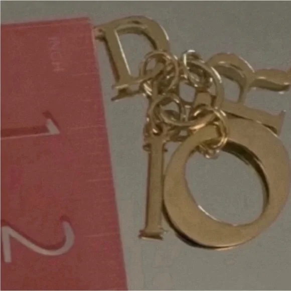 DIOR LOGO Keychain Handbag
Charm Gold Tone Metal 
Christian Dior Beauty - Picture 4 of 5